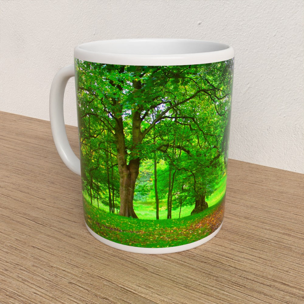 Mug with a forest design on a wooden surface