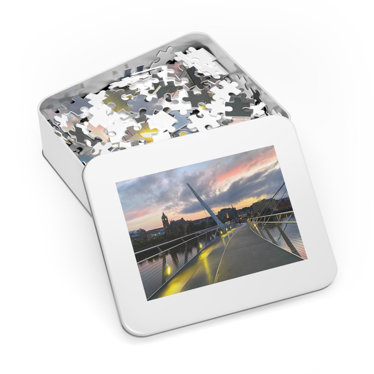 Jigsaw puzzle in a tin box with a scenic cover