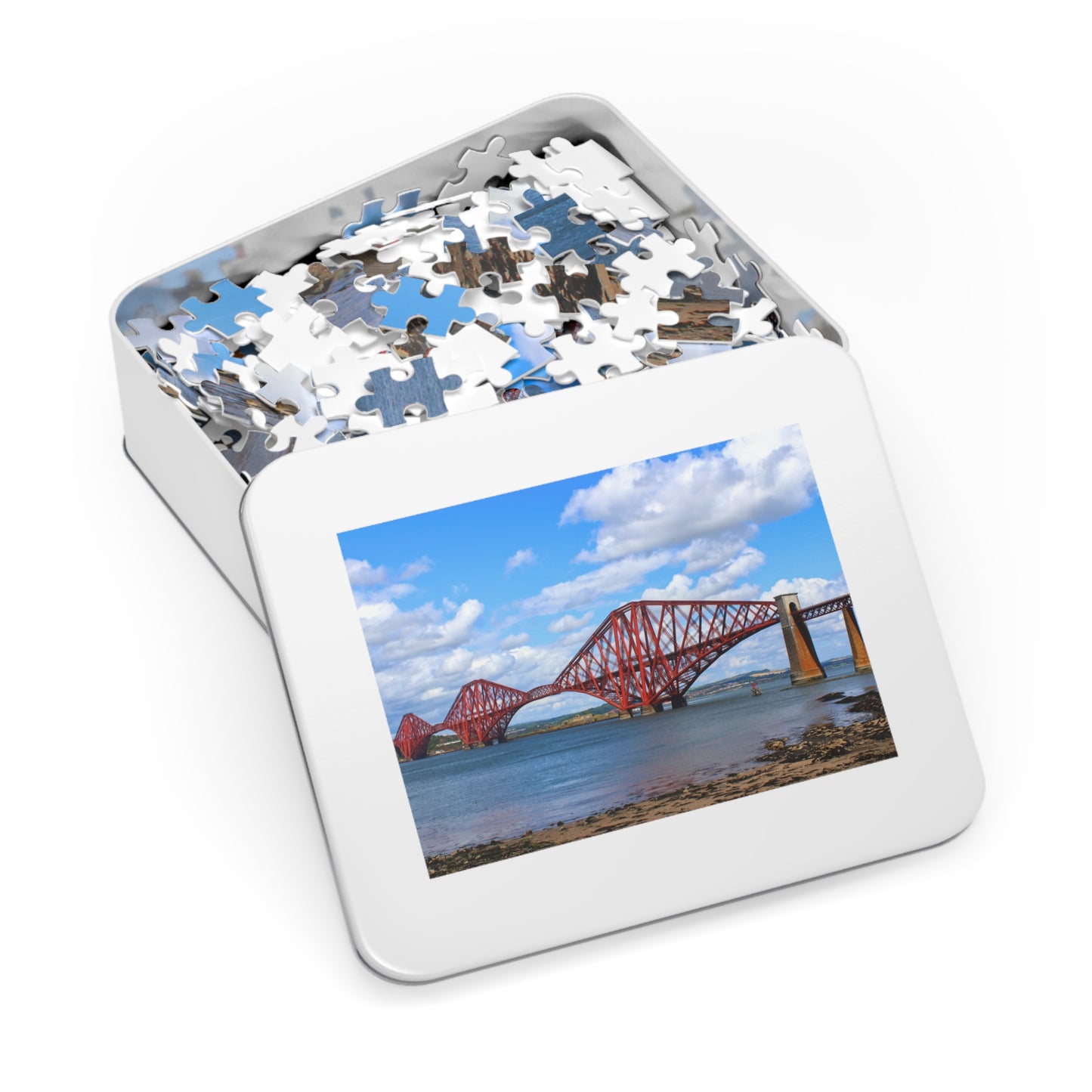 Jigsaw puzzle in a tin with a picture of a bridge on the lid