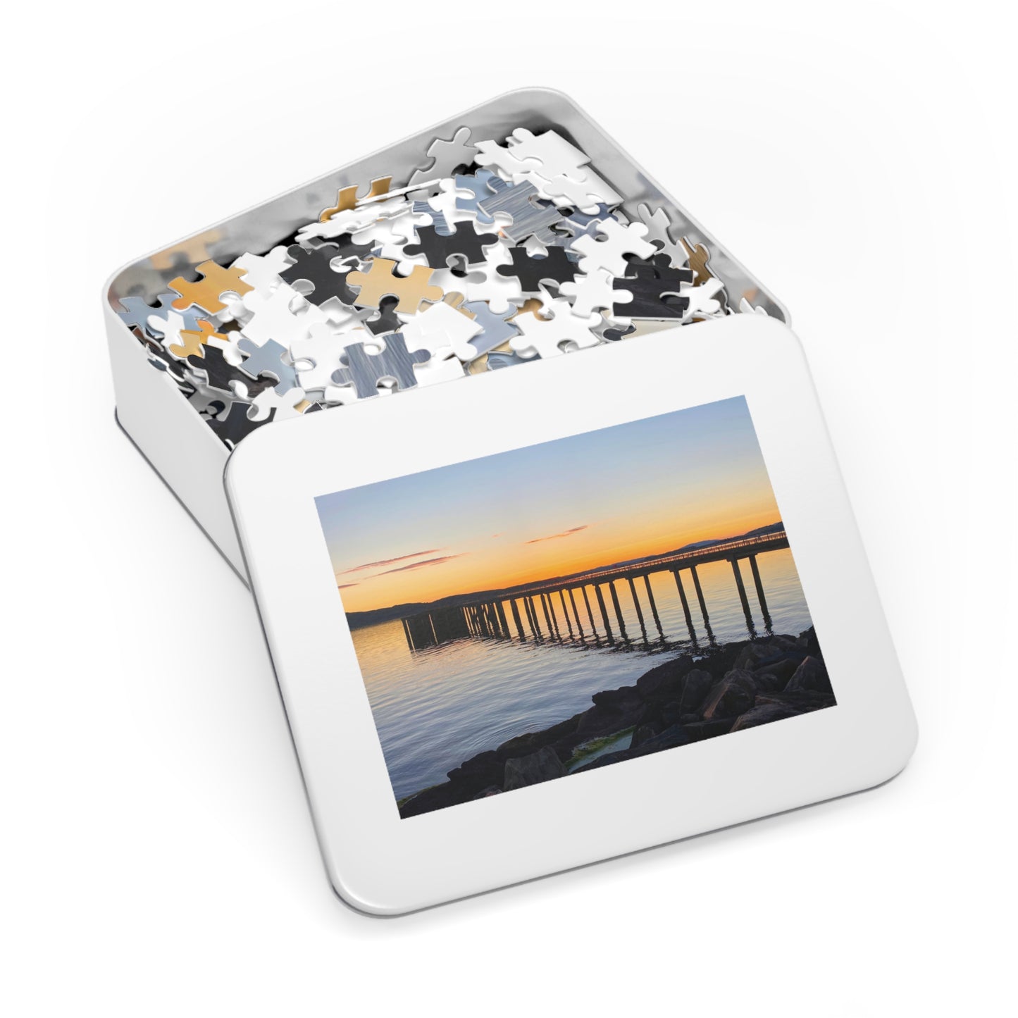 Jigsaw puzzle in a tin with a scenic cover