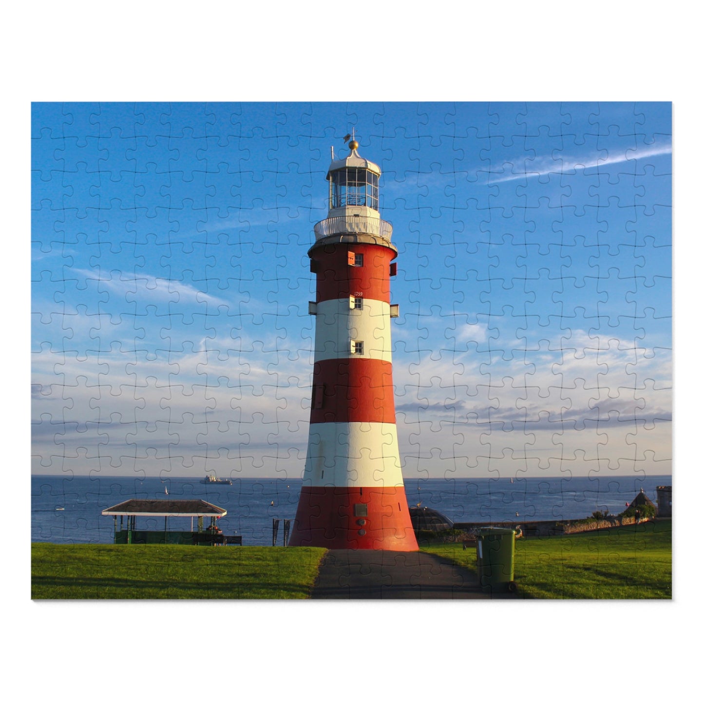 Jigsaw puzzle with a lighthouse design on a white background