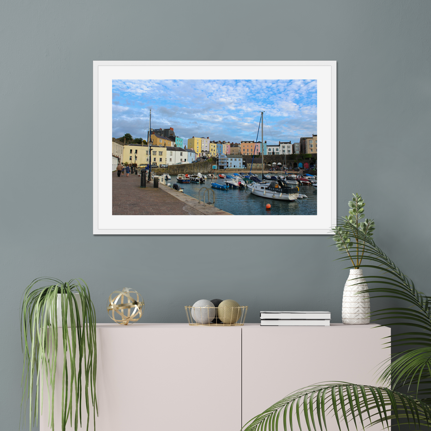 Framed photo of a harbour scene with colourful buildings and boats under a blue sky