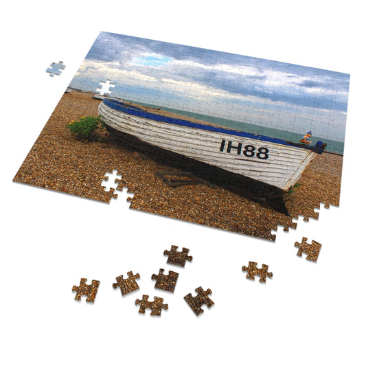Jigsaw puzzle with a boat on a beach scene, missing pieces.