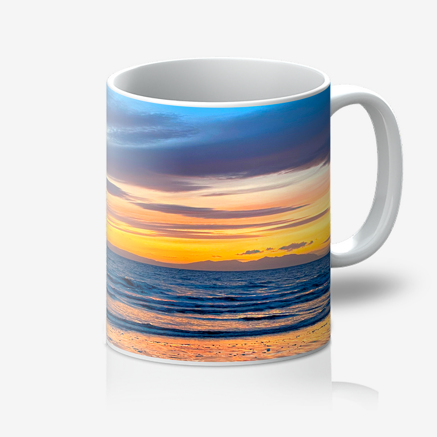 Mug with a sunset design on a white background