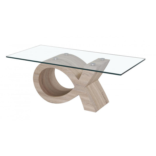 Modern coffee table with glass top and wooden base on a white background