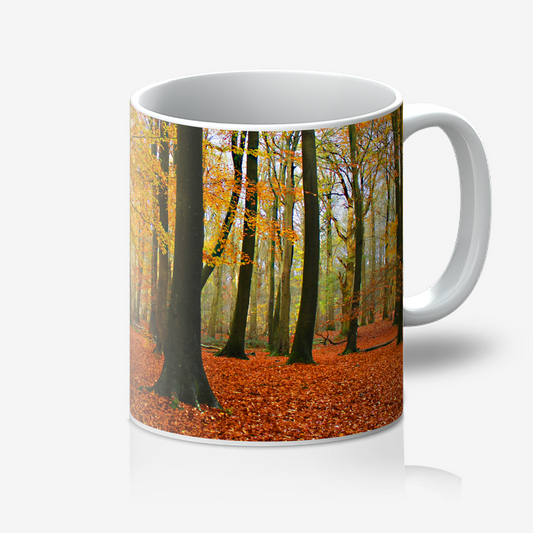 Mug with a design of an autumn forest on a white background
