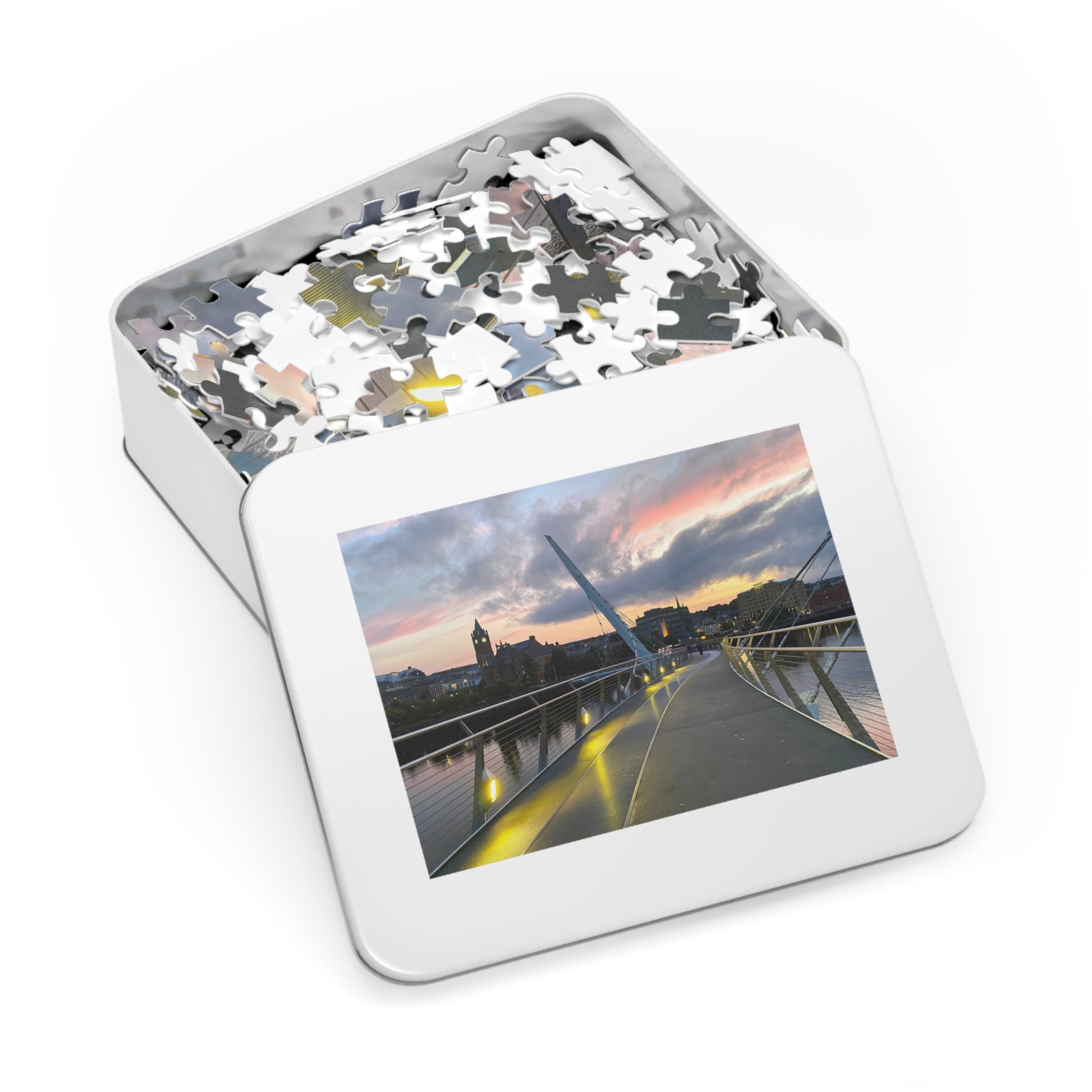 Jigsaw puzzle in a tin box with a scenic cover