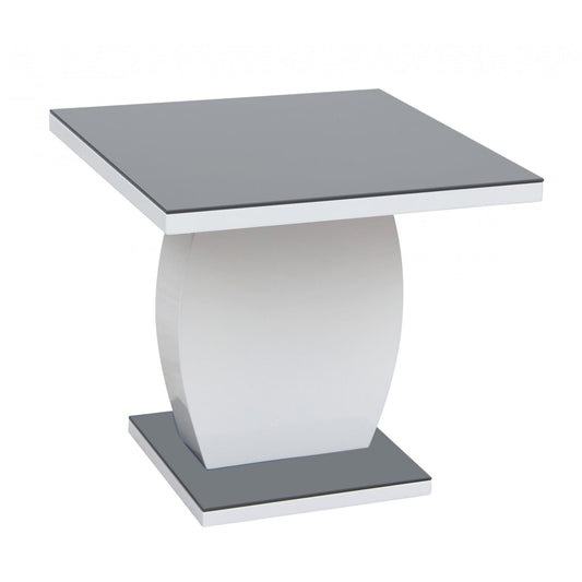 Modern side table with a gray top and white base on a white background