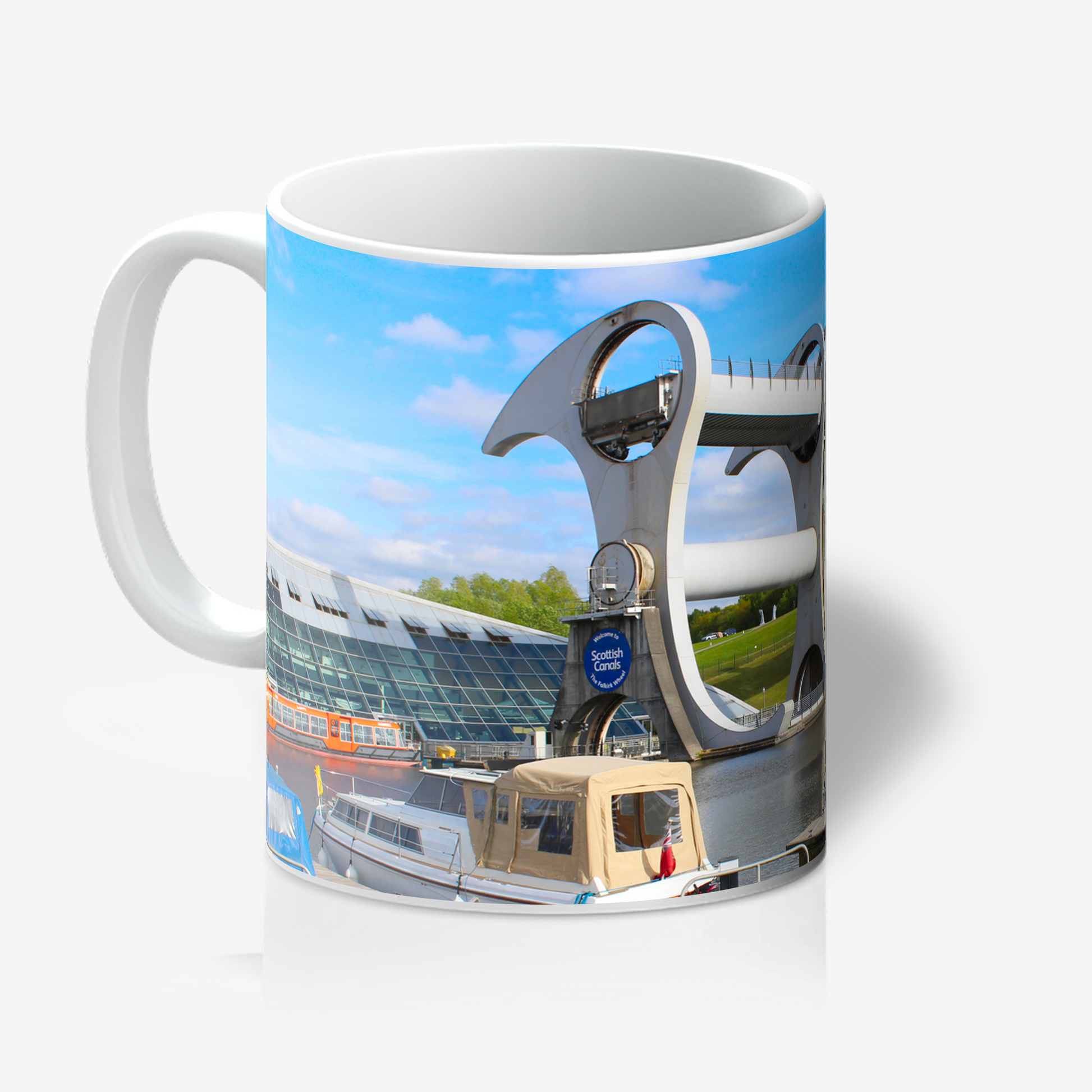 Mug with a scenic design of a bridge and boat on a white background