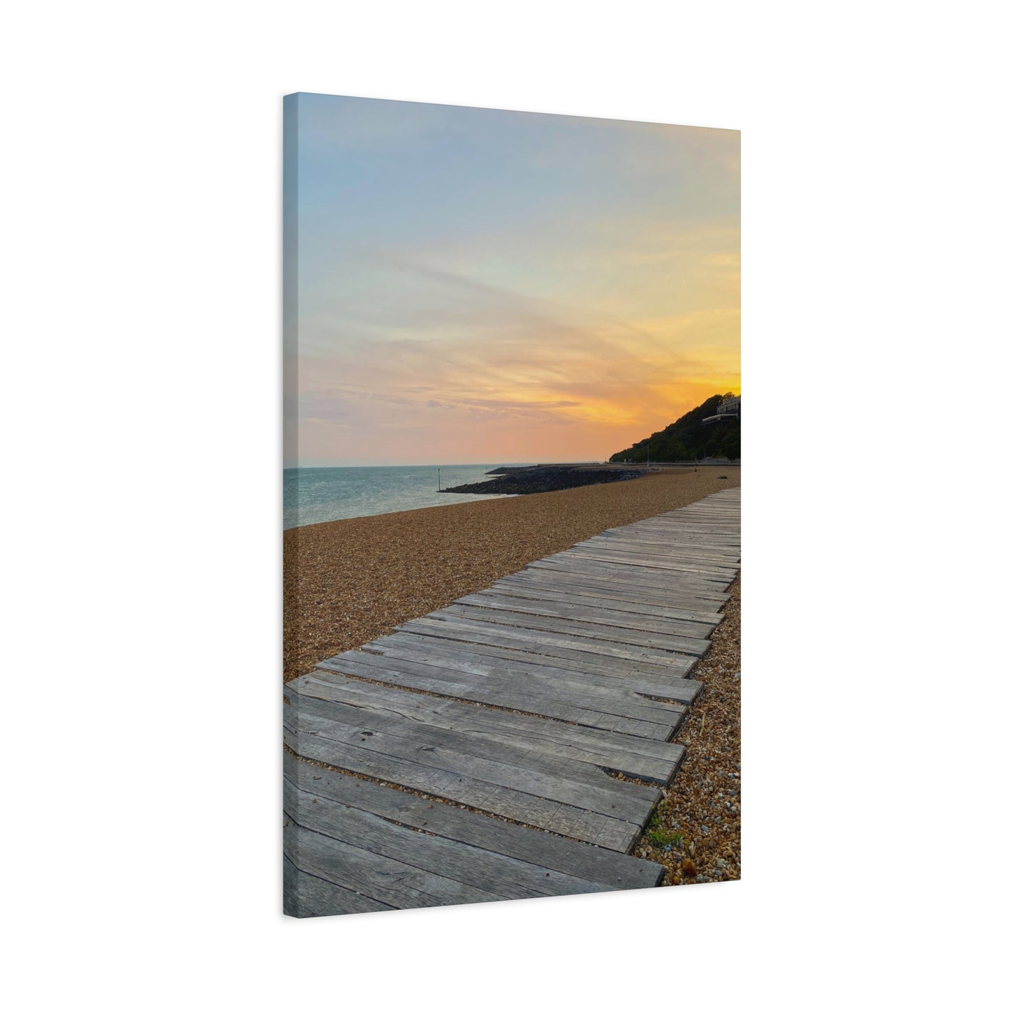 Canvas print of a wooden pathway leading to a beach at sunset.