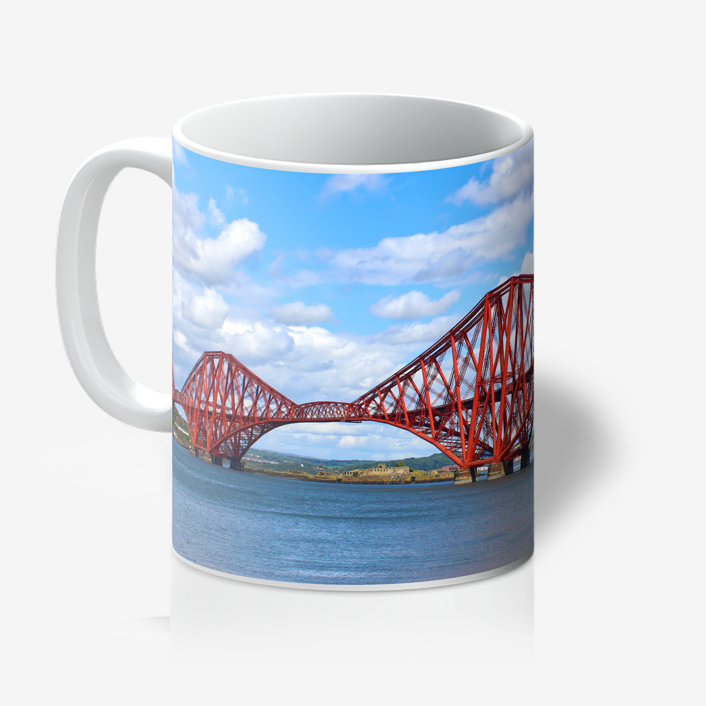Mug with a design of a red bridge over water on a white background