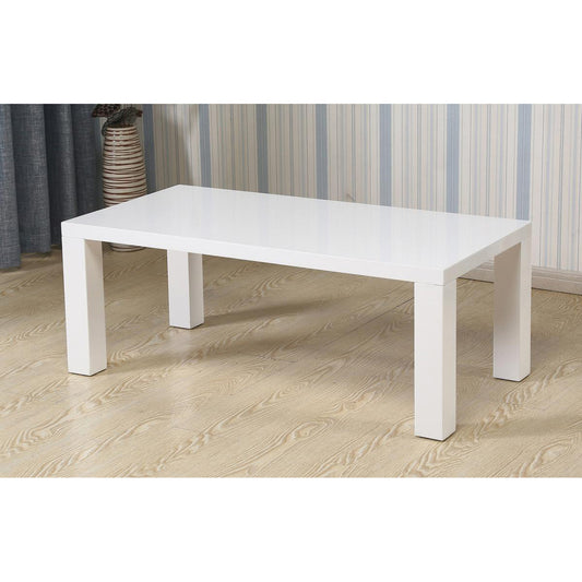 White high gloss coffee table on a wooden floor with striped wallpaper in the background