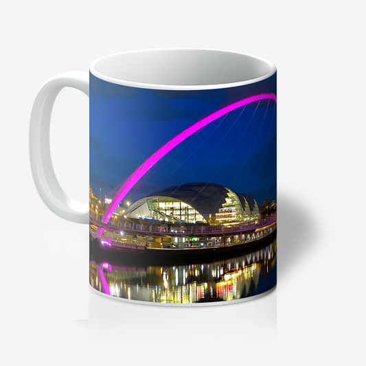 Mug with a colorful bridge and building design on a white background