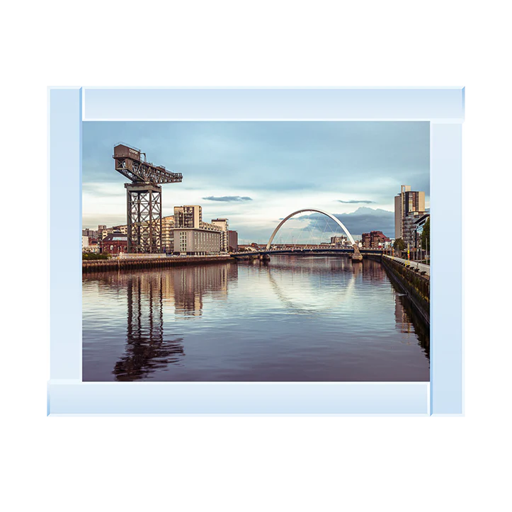 Silver mirror framed picture of a Glasgow landscape overlooking the River Clyde. In the picture you can see famous landmarks like the Clyde Arc Bridge and the Finnieston Crane.