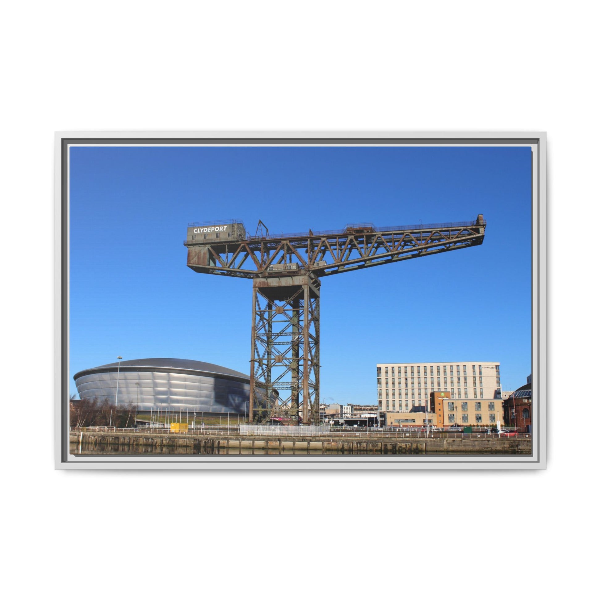 Famous industrial crane with modern buildings in the background