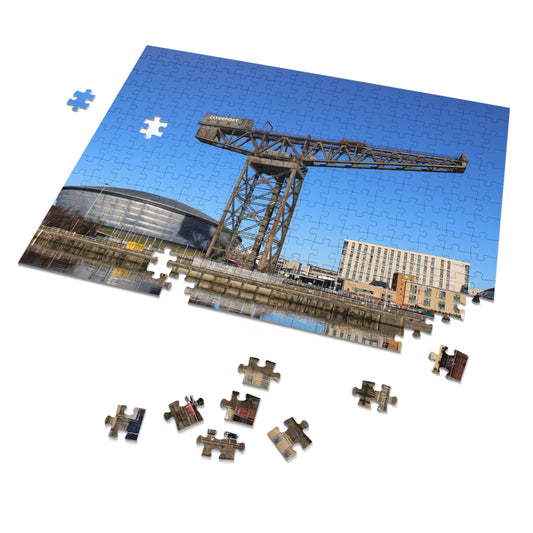 Jigsaw puzzle with a partially completed view of a crane and building against a blue sky.