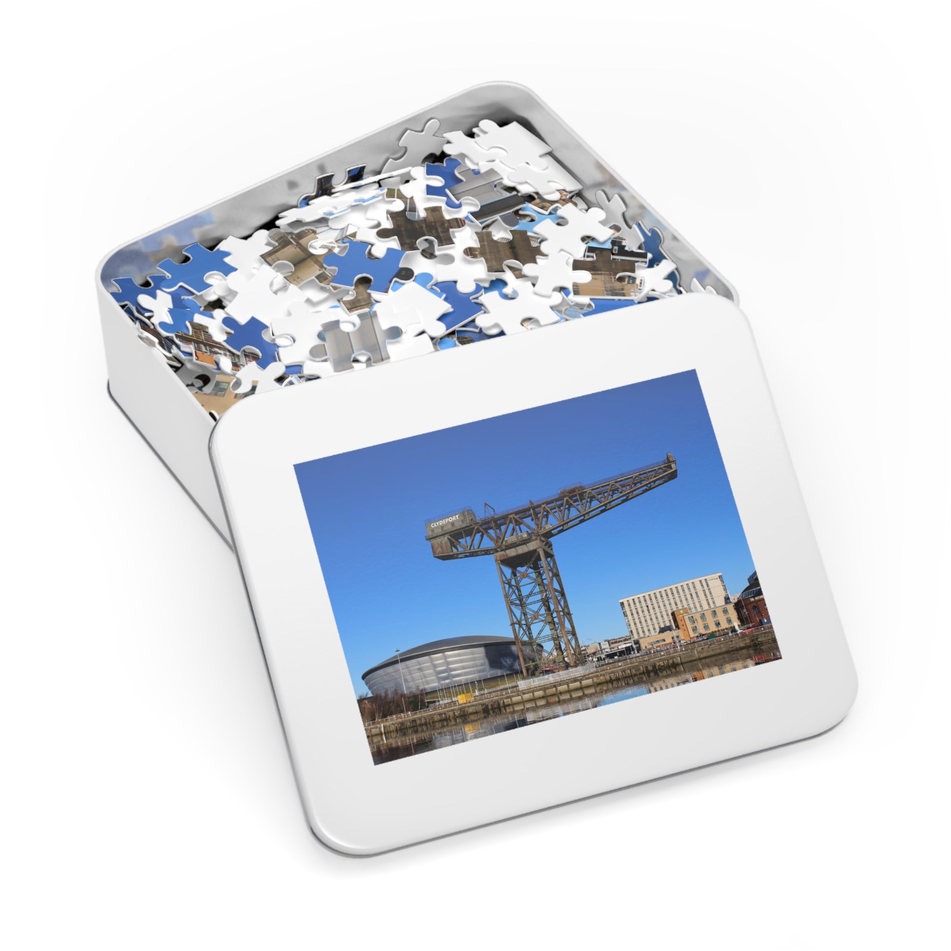 Jigsaw puzzle in a tin with a picture of a crane on the lid