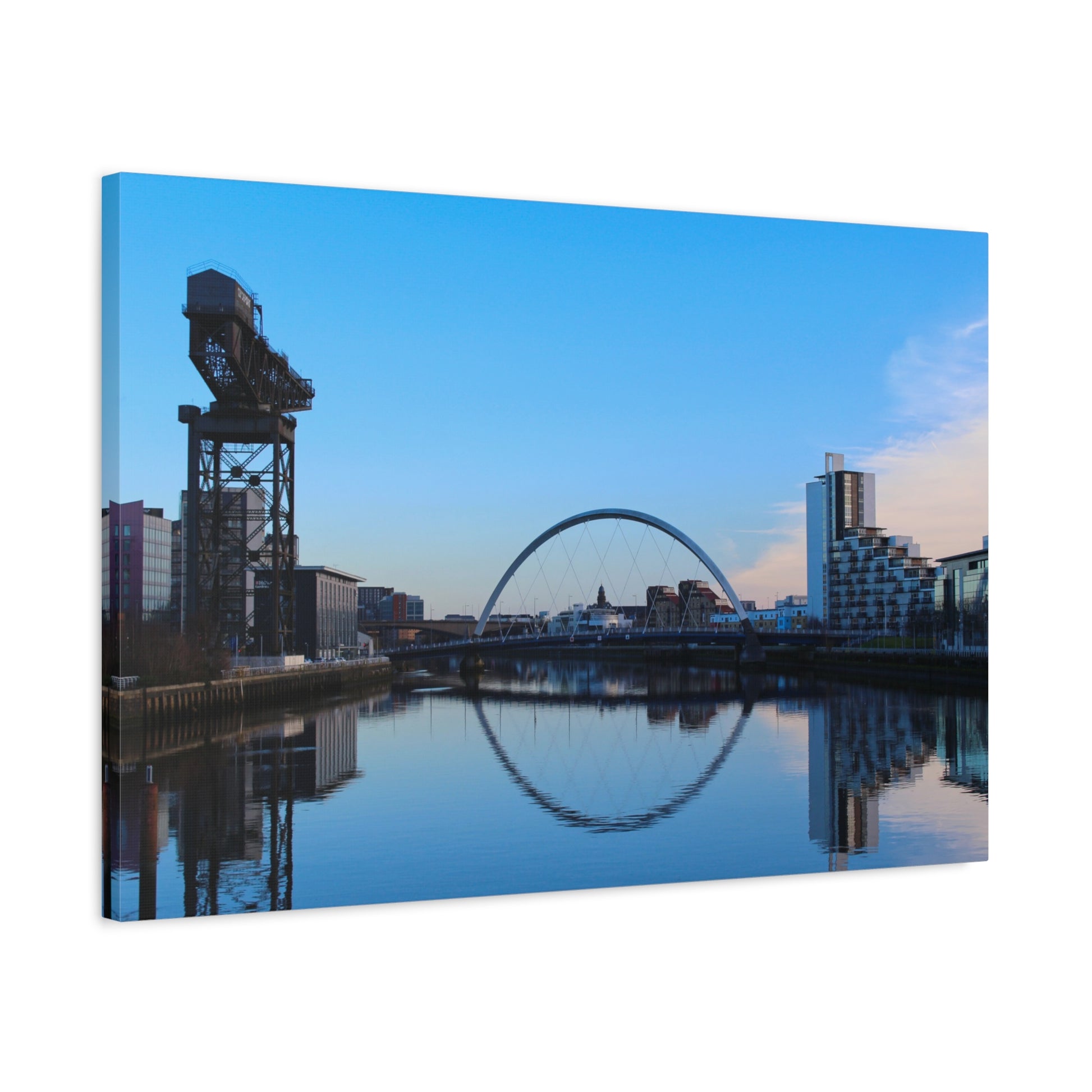 Cityscape with a distinctive arch reflection in water, featuring modern and industrial architecture.