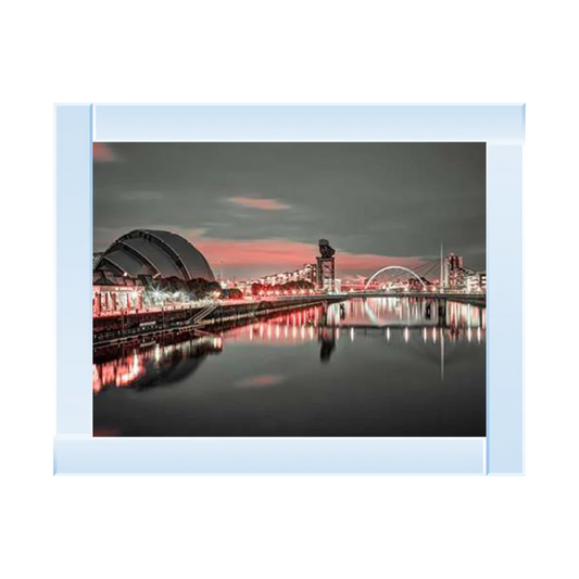 Silver mirror framed picture of a Glasgow landscape at night along the River Clyde. The landscape contains the SECC Armadillo and the Clyde Arc Bridge.