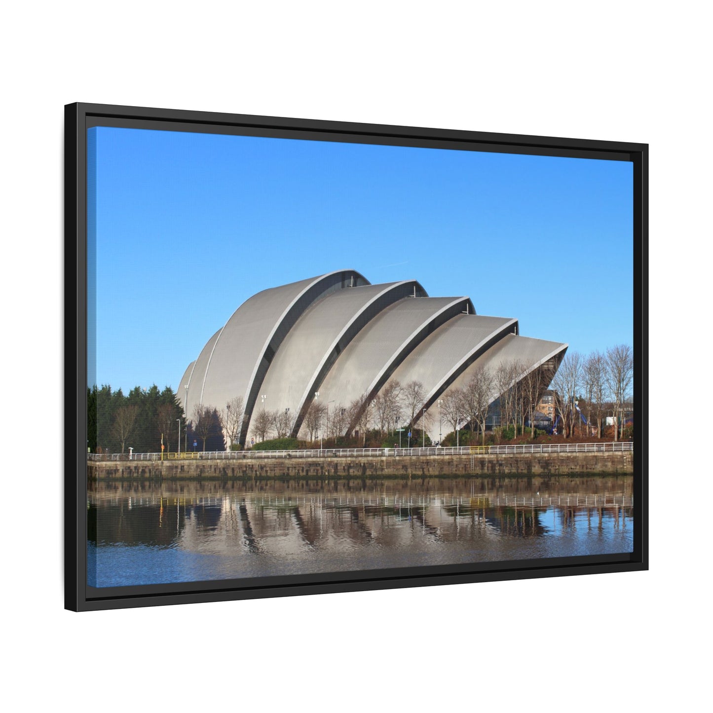 Modern architectural building with a reflective surface on a clear day