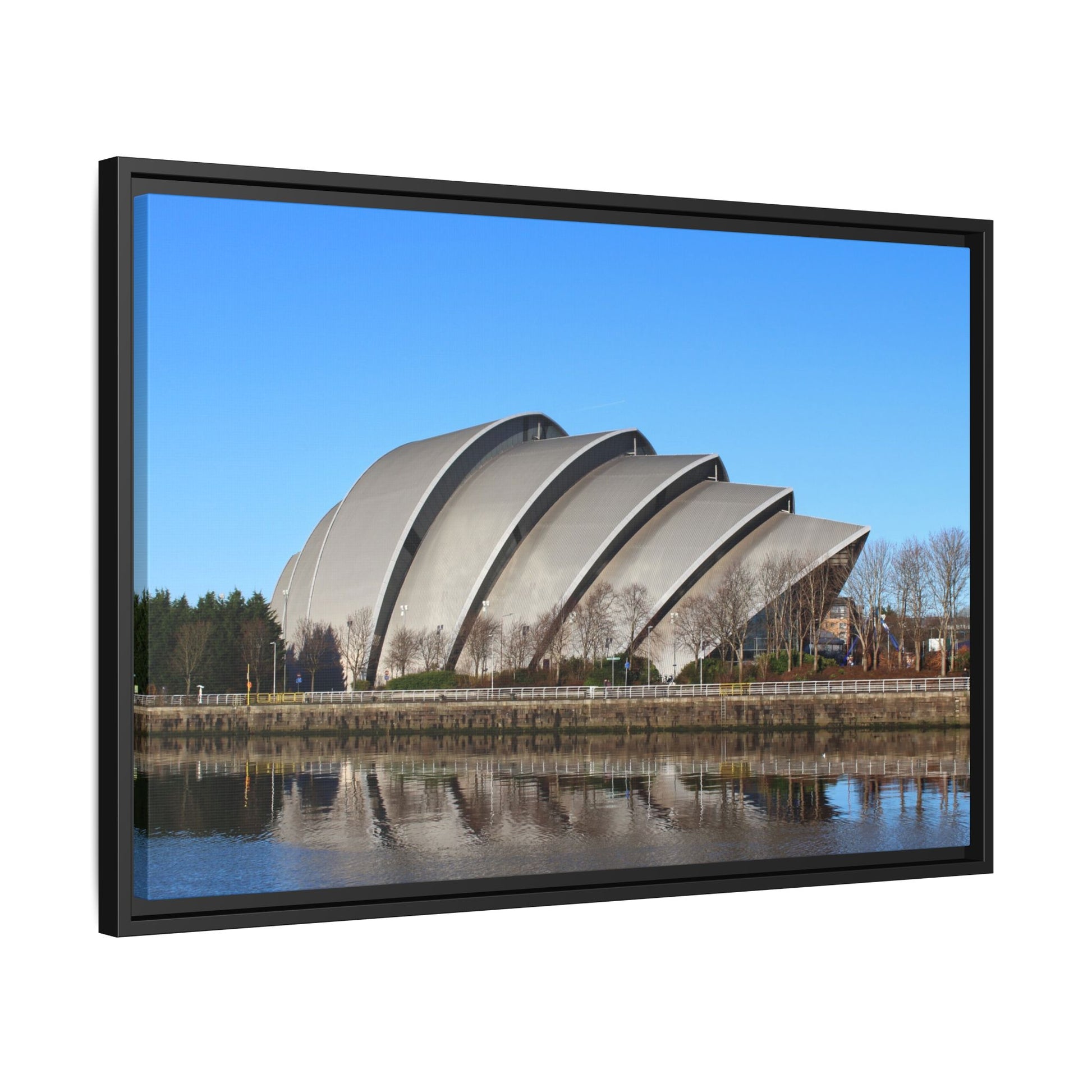 Modern architectural building with a reflective surface on a clear day