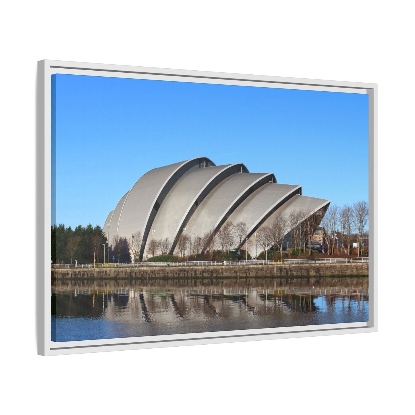 Modern architectural building with a reflective surface on a clear day