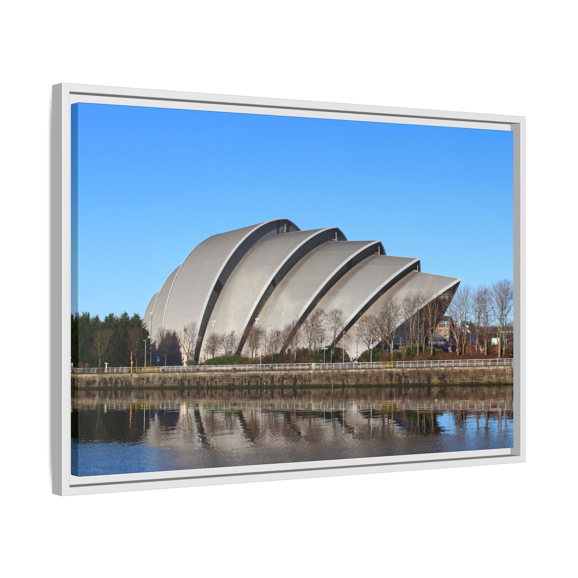 Modern architectural building with a reflective surface on a clear day