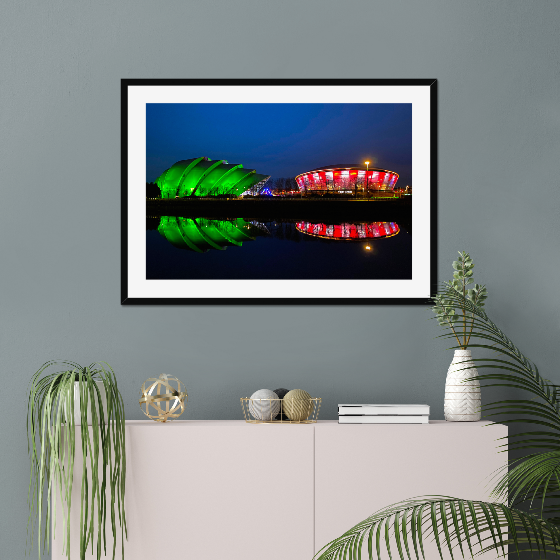 Framed photograph featuring the Glasgow SEC Armadillo and Hydro buildings lit up at night, reflected in the water of the Clyde.