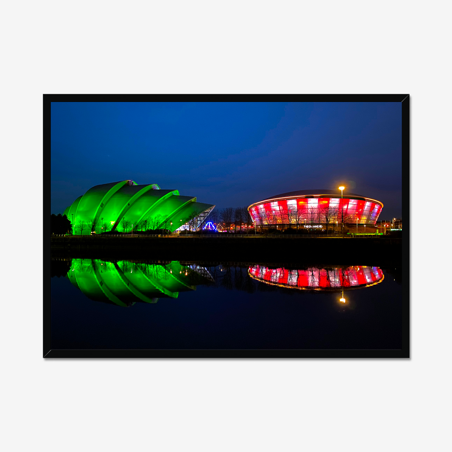 Framed photograph featuring the Glasgow SEC Armadillo and Hydro buildings lit up at night, reflected in the water of the Clyde.