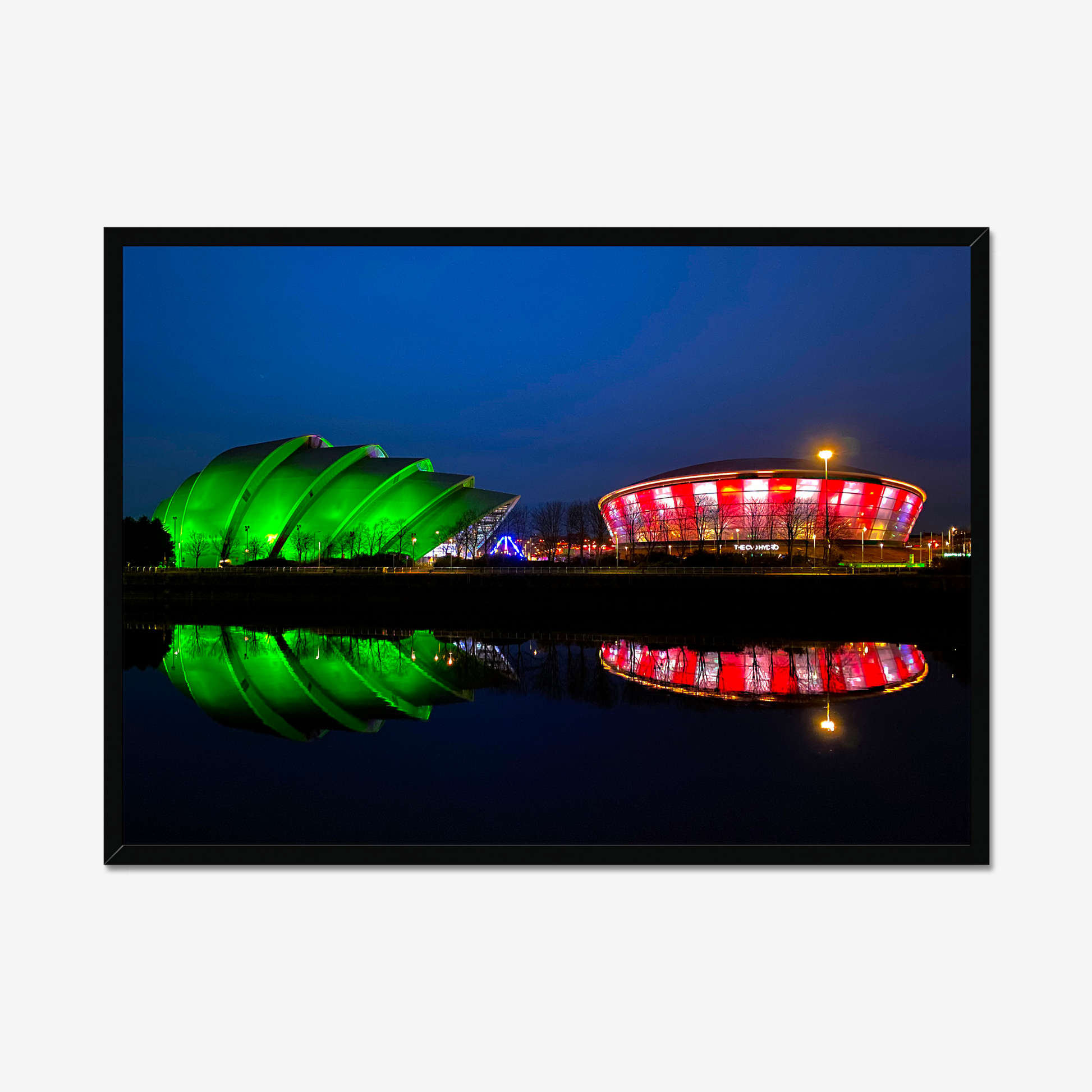 Framed photograph featuring the Glasgow SEC Armadillo and Hydro buildings lit up at night, reflected in the water of the Clyde.
