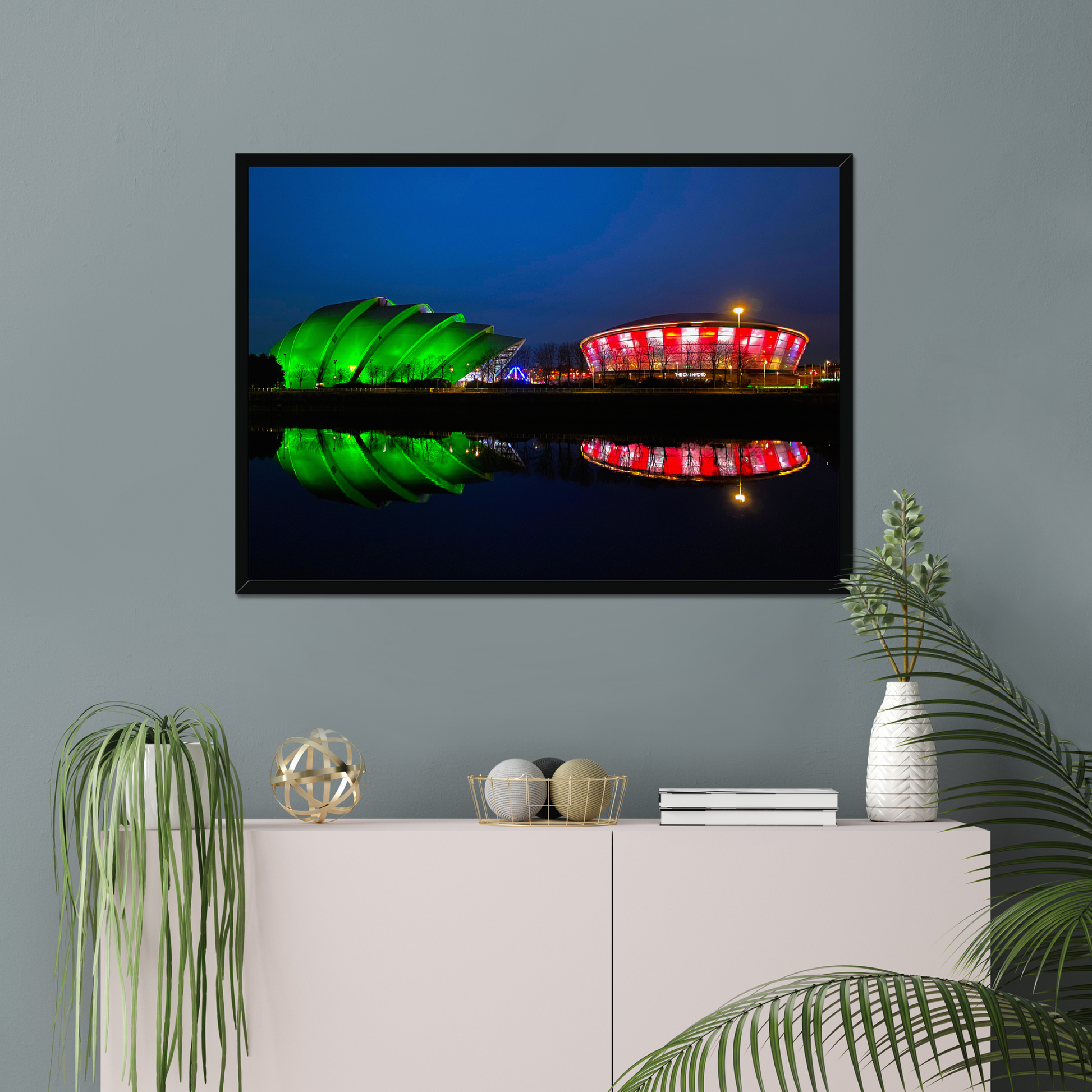 Framed photograph featuring the Glasgow SEC Armadillo and Hydro buildings lit up at night, reflected in the water of the Clyde.