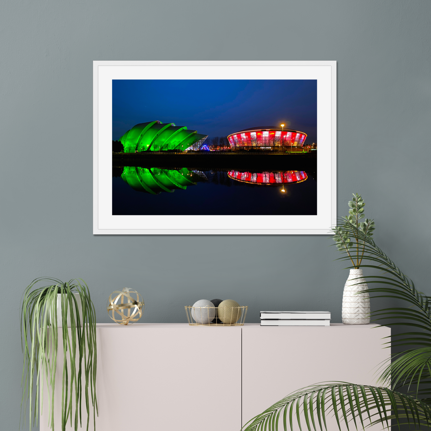Framed photograph featuring the Glasgow SEC Armadillo and Hydro buildings lit up at night, reflected in the water of the Clyde.