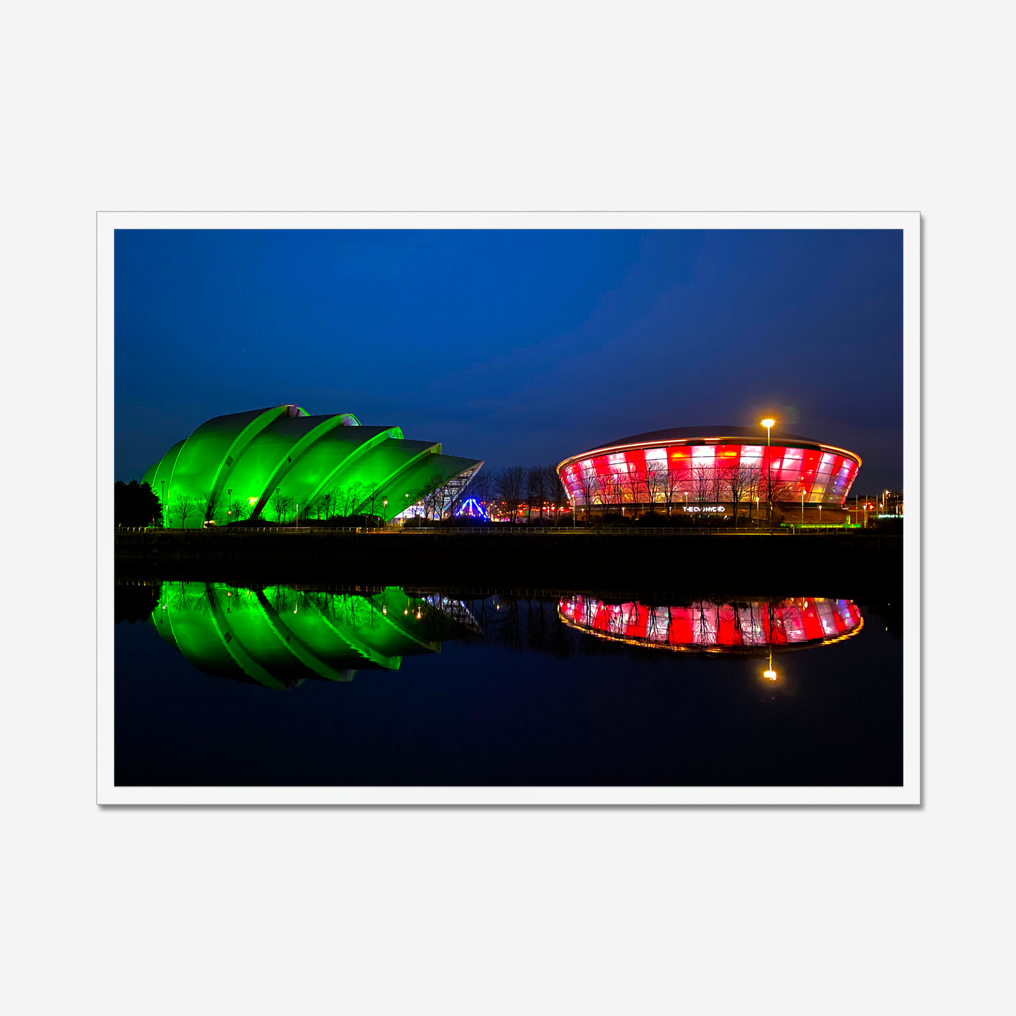 Framed photograph featuring the Glasgow SEC Armadillo and Hydro buildings lit up at night, reflected in the water of the Clyde.