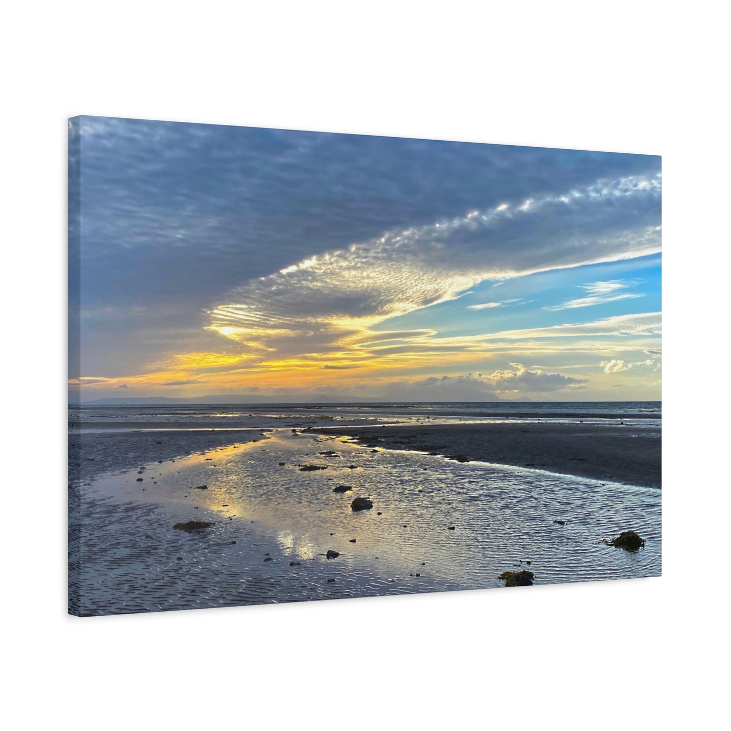Canvas print of a beach scene with a sunset sky.