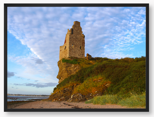 Framed Photo of Ruins of a tower on a cliff with a blue sky and clouds in the background