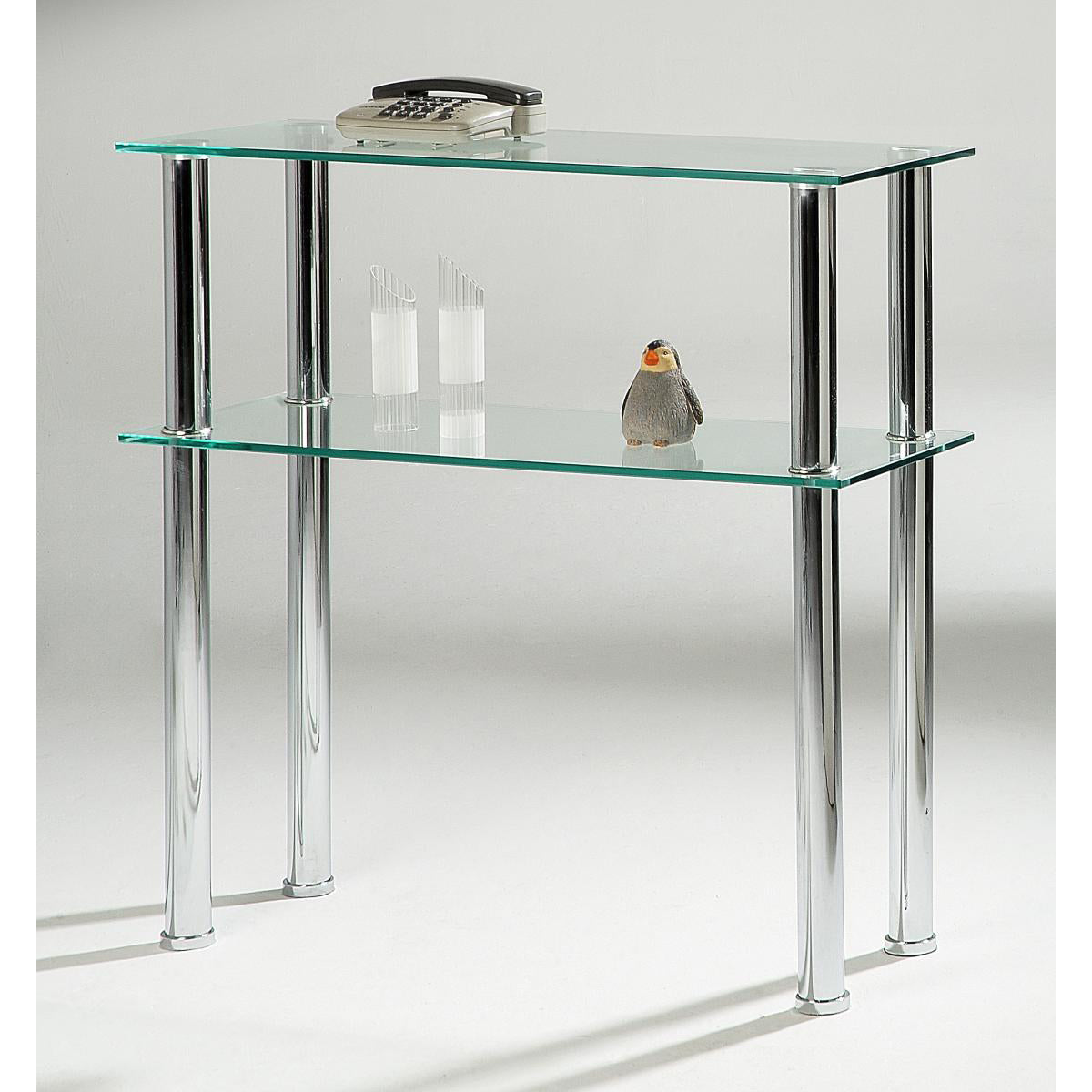 A clear glass console table with chrome legs, featuring a bird perched on it and a few objects on the table.
