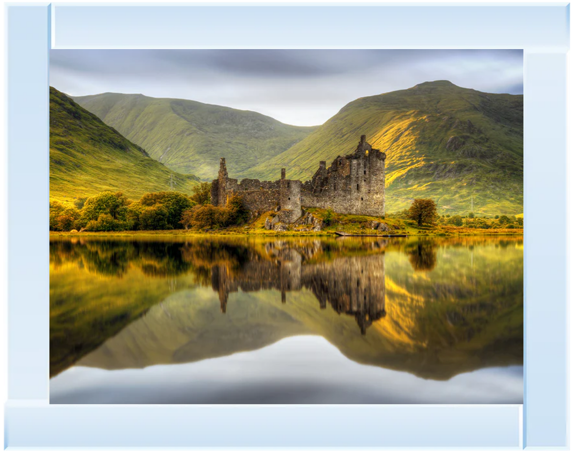 Mirror framed wall art with a castle reflected in a lake with mountains in the background.