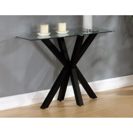 Black gloss and glass console table with a rectangular clear glass top and a black metal frame, placed on a wooden floor against a grey wall background.
