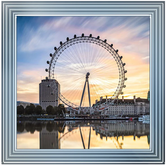 Silver framed picture of the London Eye at dusk.