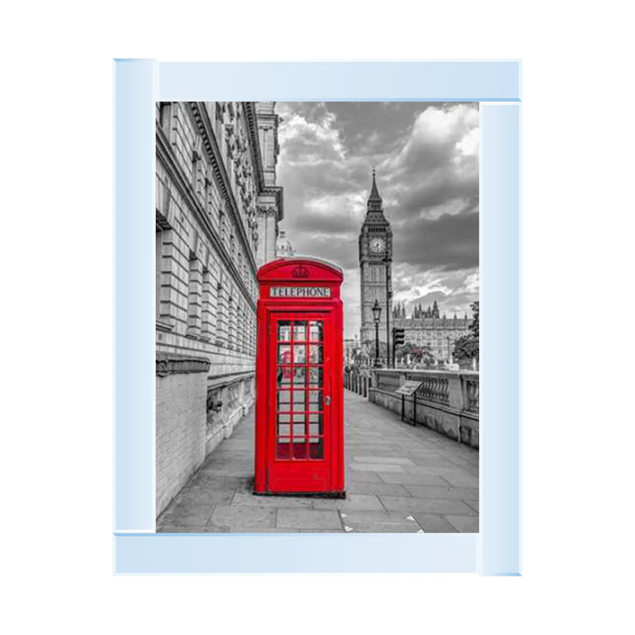 Framed picture featuring a red London telephone box with Big Ben in the background, predominantly in black and white.