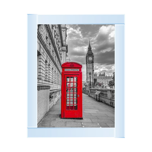 Framed picture featuring a red London telephone box with Big Ben in the background, predominantly in black and white.