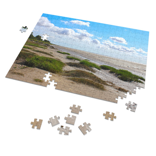 Jigsaw puzzle of a landscape with grass and clouds on a white background