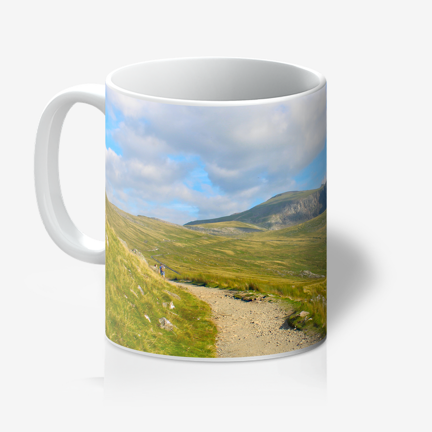 Mug with a scenic design of a mountain landscape on a white background