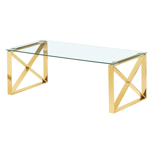 Glass coffee table with gold geometric legs on a white background