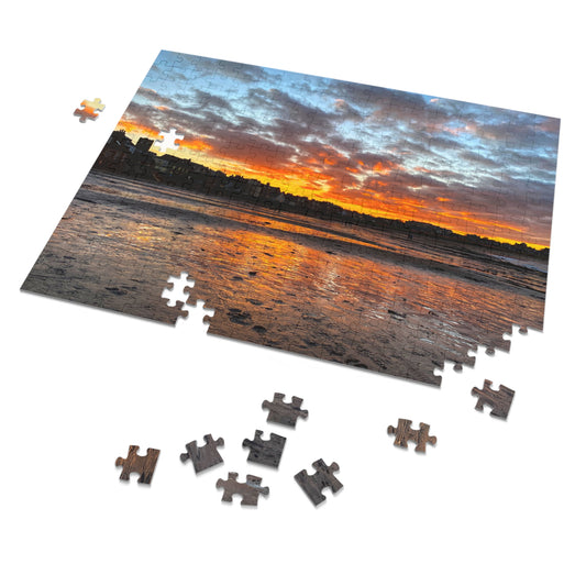 Jigsaw puzzle with a sunset over water scene, some pieces missing.