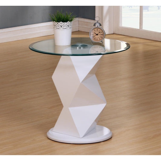 Modern glass side table with geometric base on a wooden floor