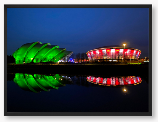 Framed Photo featuring the Glasgow SEC Armadillo and Hydro buildings lit up at night, reflected in the water of the Clyde.