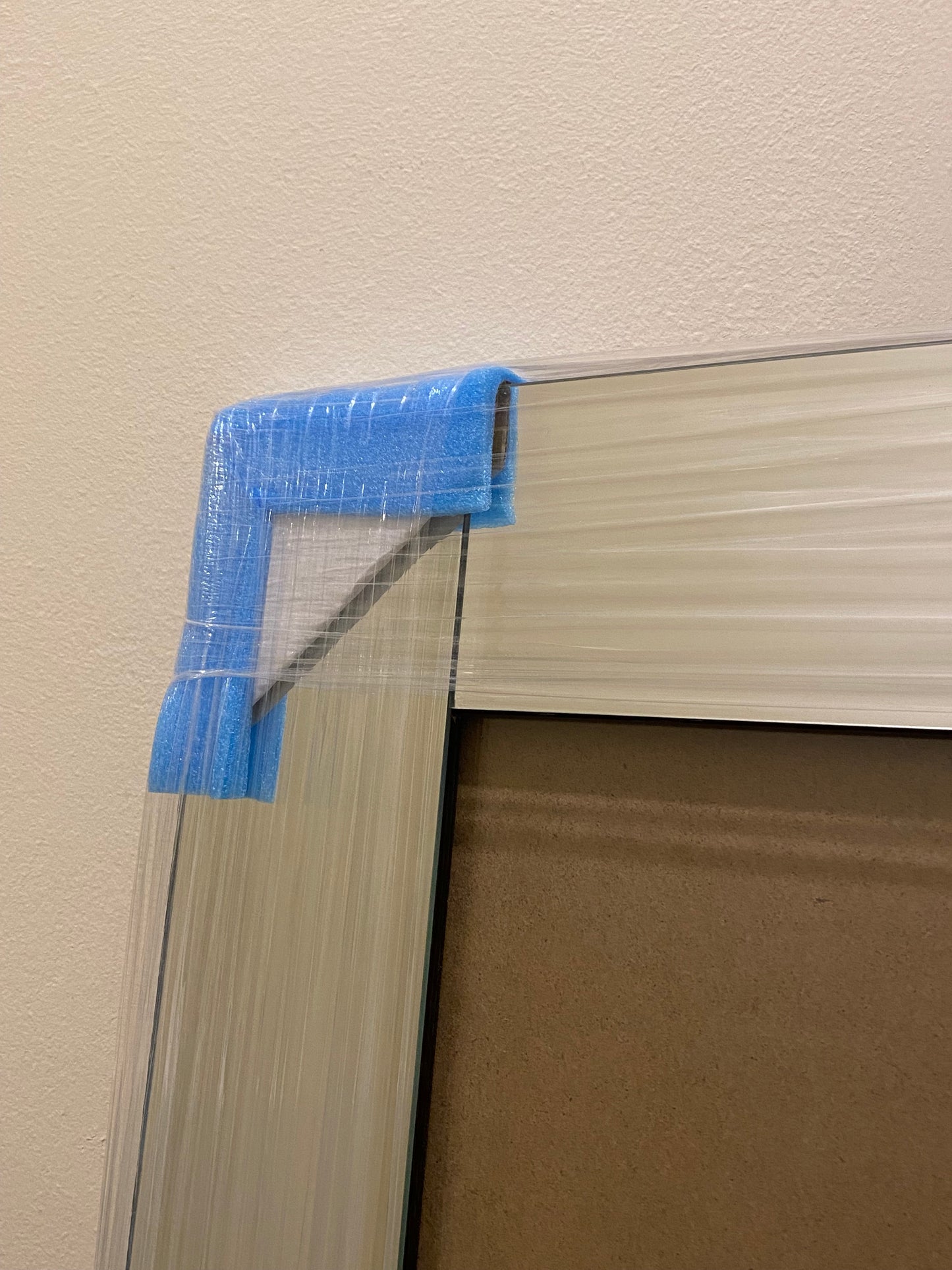 Corner of a mirrored picture frame