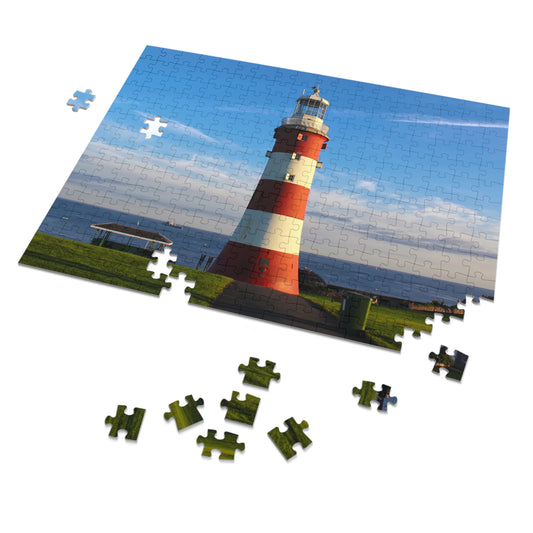 Jigsaw puzzle with a lighthouse scene on a white background