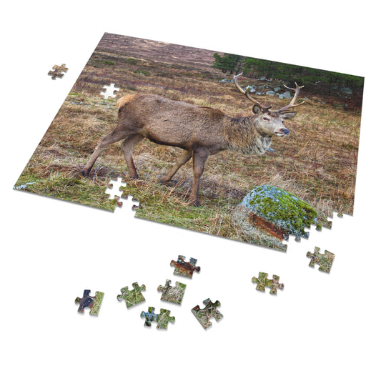 Jigsaw puzzle with a deer in a natural setting, some pieces missing.